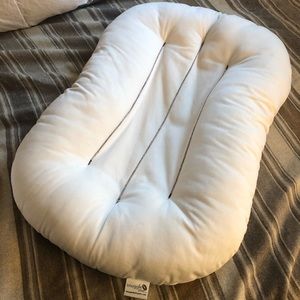 Snuggle me organic sensory baby lounger.